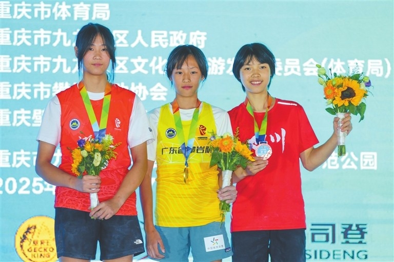 Tan Youtian (M) wins a gold medal in the bouldering finals of the national climbing championships on September 7.