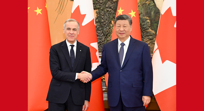 习近平会见加拿大总理卡尼