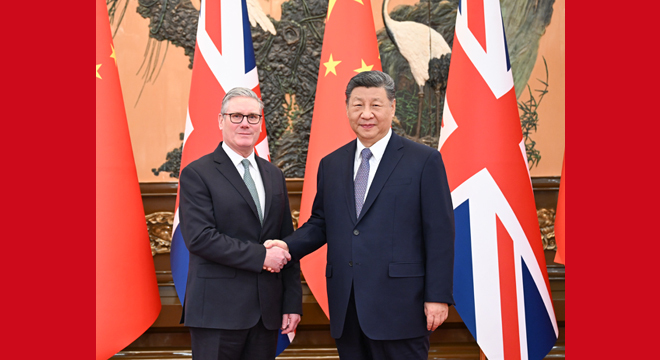 习近平会见英国首相斯塔默