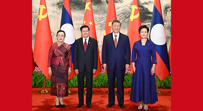 习近平同老挝人民革命党中央总书记、国家主席通伦举行会谈